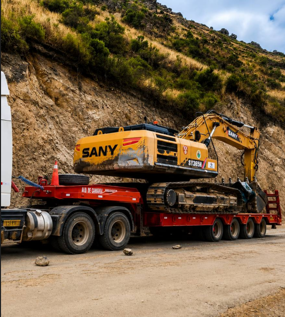 Remolcador trasladando Excavadora